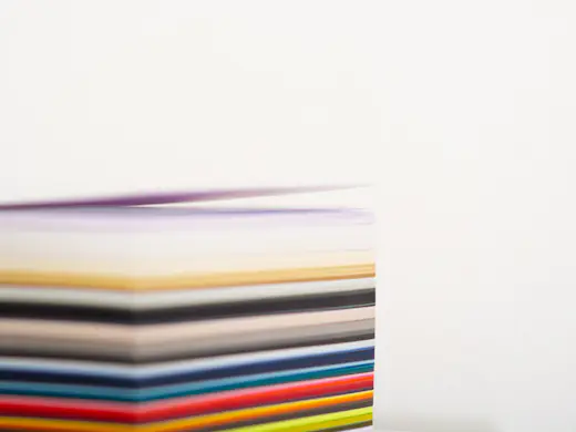 A stack of coloured PVC foam boards